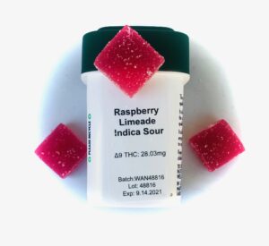 wana raspberry limeade indica sour chews container with wana chews in a triangle formation