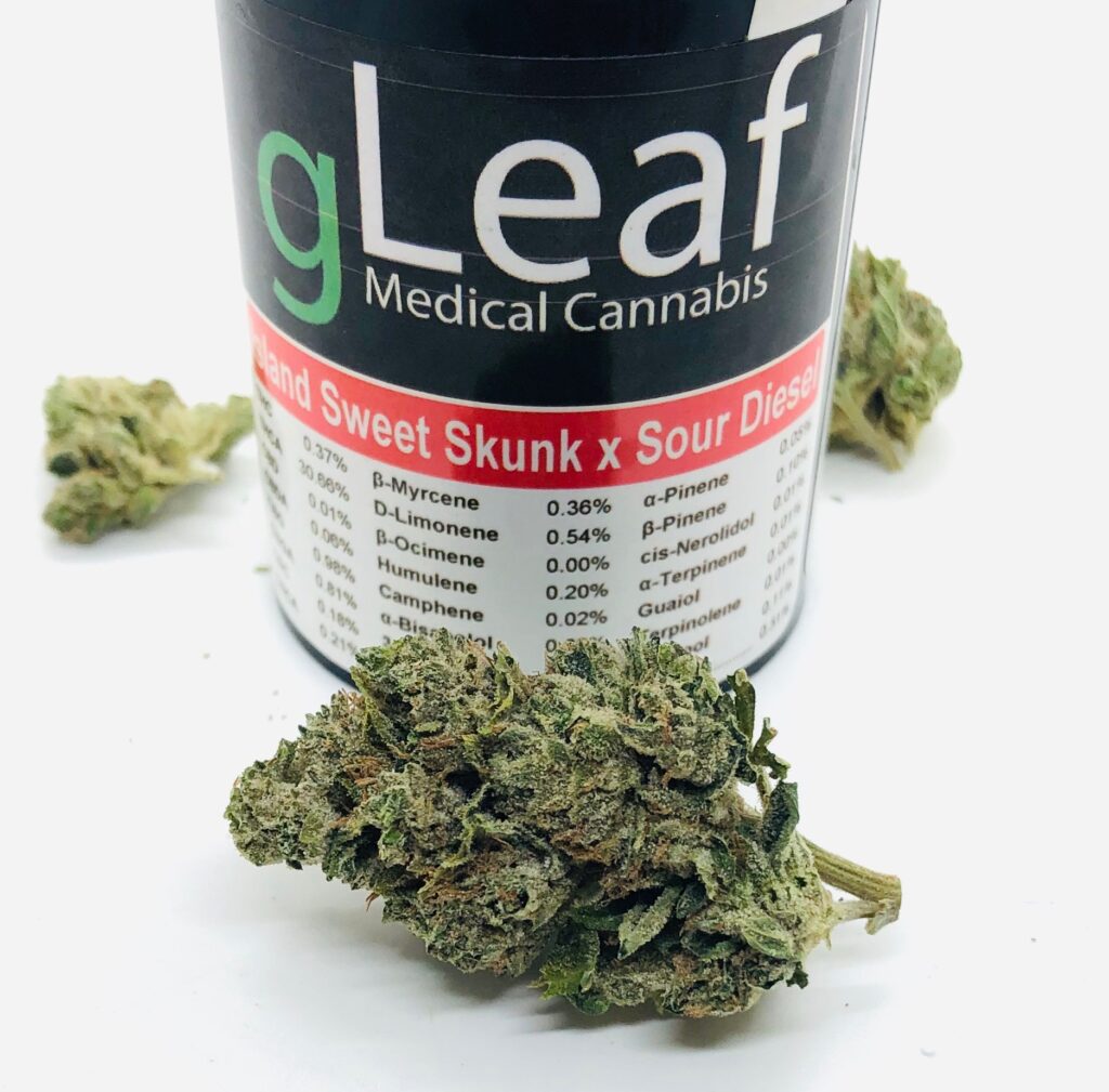 buds of island sweet skunk by gleaf in front of gleaf container
