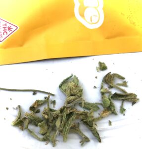 untrimmed guard leaves and stems found in roll one orange cookies